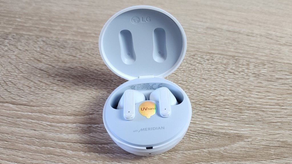 lg tone free fp9 on table